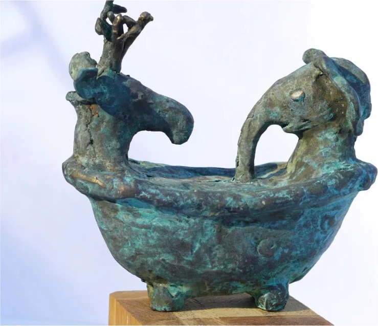 Sculpture in patinated bronze: a bathtub with two elephants